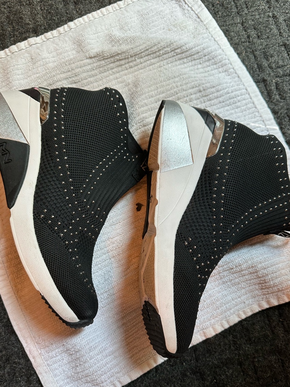 Skechers Black Knit Slip-On Wedge Sneakers with White Midsole and Silver Accents